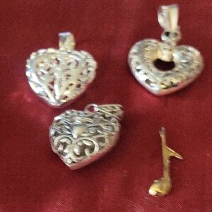 SOLD.....3 Heart Pendants An A Note Pendant